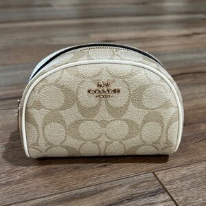 Coach Tan Monogram dome cosmetic bag